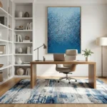 Layered abstract hand-painted canvas in deep ocean blues and textured brushstrokes, contemporary office space