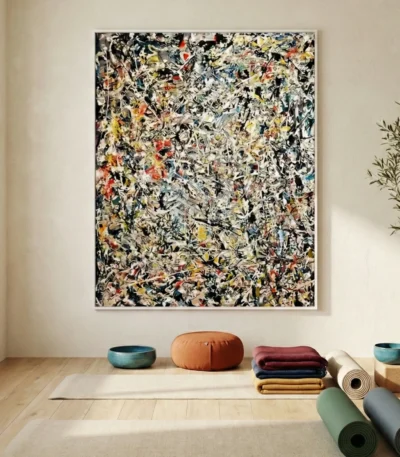 Gestural abstract expressionist hand-painted canvas in black, cream, and vibrant accents with dynamic layered brushstrokes, yoga studio setting