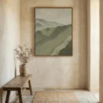 Textured landscape hand-painted canvas depicting rolling hills in muted greens and grays, contemporary entryway