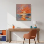 Impressionist seascape hand-painted canvas depicting vibrant orange sunset reflection on water, warm and cool tones, contemporary workspace