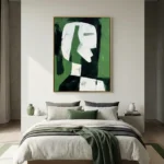 Minimalist figurative hand-painted canvas with white geometric profile and green abstract background, contemporary bedroom setting