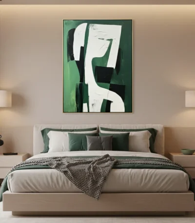 Contemporary abstract hand-painted canvas in layered green, white and black geometric forms, modern bedroom setting