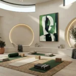 Contemporary abstract hand-painted canvas with green and monochrome figure study, yoga studio setting