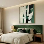 Contemporary abstract hand-painted canvas with geometric face composition in forest green, cream and black, modern bedroom