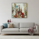 Gestural abstract hand-painted canvas with layered red, blue, and gold brushstrokes on cream ground, contemporary living space