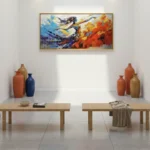 Gestural expressionist hand-painted canvas depicting a flying figure in vibrant blues, oranges and reds, contemporary interior space