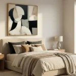 Contemporary abstract hand-painted canvas in black, cream and taupe with geometric forms, modern bedroom
