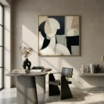 Minimalist abstract hand-painted canvas in black, cream and taupe geometric forms, contemporary office space