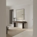Minimalist hand-painted canvas in soft cream and taupe with subtle gestural brushwork, contemporary entryway
