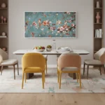 Impressionist hand-painted canvas depicting flowering branches in soft coral and cream tones against muted teal, contemporary dining space