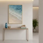 Overhead Tide textured wall art shown framed on the wall in a styled interior