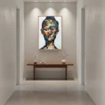 Expressionist hand-painted canvas of abstracted portrait in vibrant multicolored brushstrokes and bold gestural marks, modern entryway