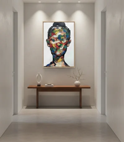 Expressionist hand-painted canvas of abstracted portrait in vibrant multicolored brushstrokes and bold gestural marks, modern entryway