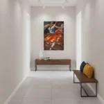 Gestural expressionist hand-painted canvas depicting a dynamic dancer in vibrant reds, golds, and warm earth tones, modern entryway