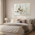 Impressionist hand-painted canvas of wildflowers in mauve, gold, and sage tones, displayed in a contemporary bedroom