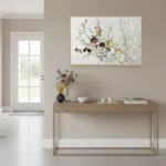 Contemporary hand-painted canvas depicting wildflowers and botanicals in muted burgundy, gold and sage tones, modern entryway