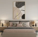 Gestural abstract hand-painted canvas with organic curved lines, gold leaf accents, and charcoal black forms on cream and taupe, styled in modern bedroom