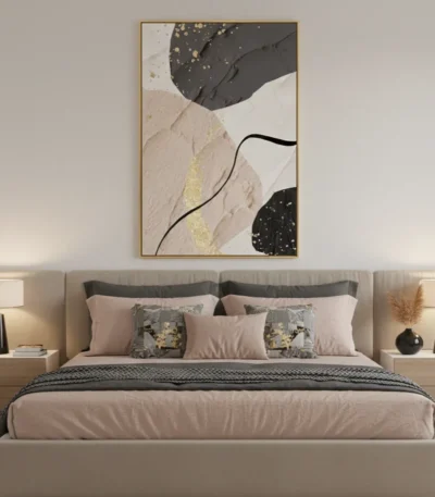 Gestural abstract hand-painted canvas with organic curved lines, gold leaf accents, and charcoal black forms on cream and taupe, styled in modern bedroom
