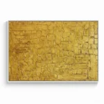 Textured abstract hand-painted canvas in layered gold and ochre tones with geometric relief patterns, contemporary living space