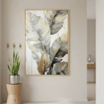 Contemporary hand-painted canvas of layered feathers in charcoal, gold and cream tones, modern entryway