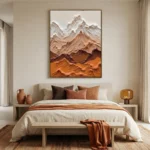 Textured layered hand-painted canvas depicting snow-capped and terracotta mountains in warm earth tones, modern bedroom