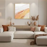 Layered abstract hand-painted canvas in warm terracotta, ochre, and cream tones with flowing gestural brushstrokes, contemporary living space