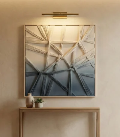 Layered abstract hand-painted canvas with sweeping gestural brushstrokes in cream, charcoal, and slate blue tones, contemporary entryway