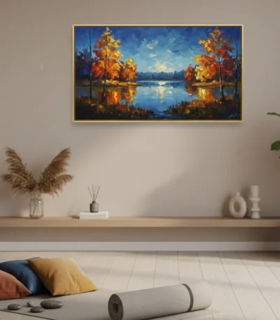 Impressionist landscape hand-painted canvas depicting autumn trees reflecting in still water with golden and blue tones, contemporary living space