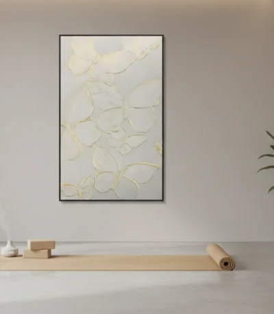 Textured minimalist hand-painted canvas with organic petal forms in cream and gold leaf, contemporary studio setting