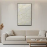 Minimalist hand-painted canvas depicting delicate floral line drawings in cream and gold tones, contemporary living space