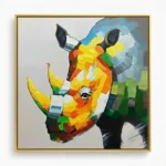 Contemporary hand-painted canvas of a colorful rhinoceros with vibrant yellow, orange, and green geometric patterns, gold frame