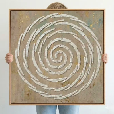 Textured hand-painted canvas with concentric white spiral pattern on muted earth tones and gold leaf accents