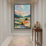 Gestural landscape hand-painted canvas in vibrant layered brushstrokes, turquoise and gold tones with cypress trees, contemporary entryway