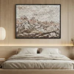 Textured abstract landscape painting in layered cream and taupe tones depicting snow-capped mountains, hand-painted canvas in modern bedroom