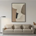 Minimalist abstract hand-painted canvas with organic curved lines in cream, taupe, and charcoal, contemporary living space