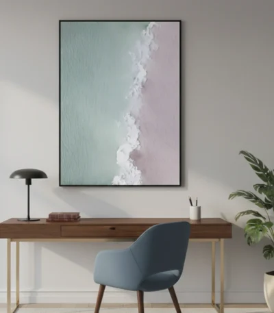 Minimalist abstract hand-painted canvas depicting soft ocean waves and shoreline in pale blue and blush tones, contemporary workspace