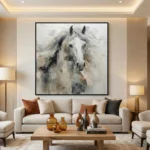 Gestural contemporary hand-painted canvas of a white horse with flowing mane in soft grays and earth tones, modern living space