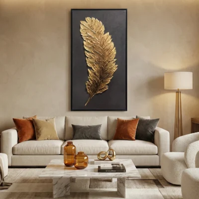 Textured gold leaf hand-painted canvas featuring an ornate feather in warm metallics against charcoal, contemporary living space