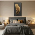 Contemporary hand-painted canvas depicting a textured gold feather against charcoal black background, modern bedroom
