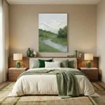 Contemporary landscape hand-painted canvas depicting snow-capped mountains, verdant valley and meandering stream in soft greens and whites, modern bedroom