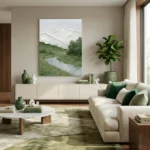 Contemporary landscape hand-painted canvas depicting snow-capped mountain, verdant valley and meandering stream in cool greens and whites, modern living space