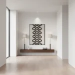 Minimalist geometric hand-painted canvas in black and cream with interlocking circular chain pattern, contemporary entryway