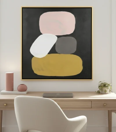 Minimalist abstract hand-painted canvas with stacked organic shapes in blush, cream, charcoal, and mustard, contemporary workspace