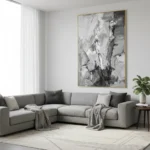 Gestural abstract expressionist hand-painted canvas in monochrome black and white with dynamic brushstrokes, contemporary living space