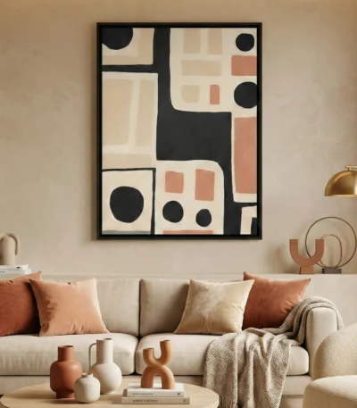 Minimalist hand-painted canvas with geometric shapes, black circles, cream rectangles, and terracotta accents, contemporary living space