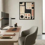 Minimalist abstract hand-painted canvas with geometric shapes, black circles, and warm terracotta tones on cream, modern office space