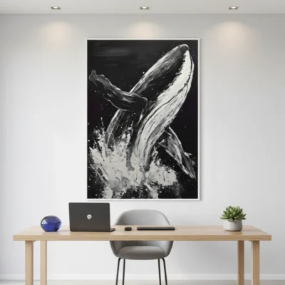 Gestural monochrome hand-painted canvas of a breaching whale with dynamic splashing water, contemporary workspace