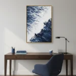 Contemporary abstract landscape painting depicting dramatic cloud formations and mountainous terrain in cool blues and whites, hand-painted canvas in modern workspace