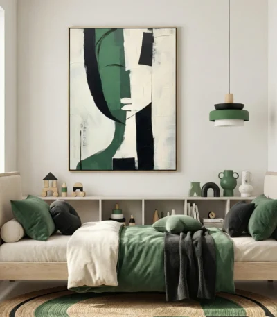 Contemporary abstract hand-painted canvas featuring geometric face in forest green, black, and cream tones, modern bedroom
