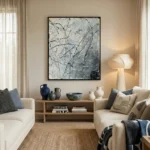 Abstract expressionist hand-painted canvas with gestural black lines and monochromatic grey tones, contemporary living space